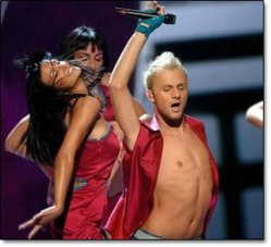 "See my vest, see my vest, plus my bronzed and hairless chest..."